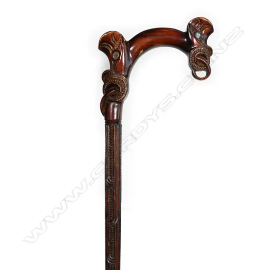 A Māori carved walking stick,